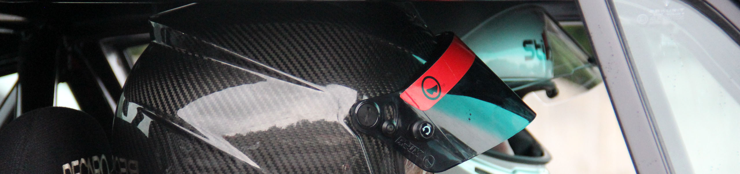 Roux Snell and FIA approved auto and kart racing helmets designed for motorsports driver safety