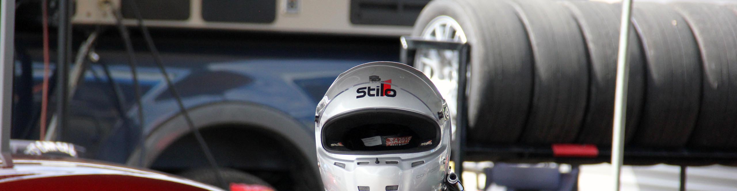Stilo Racing helmets with integrated communication systems for professional auto racing safety