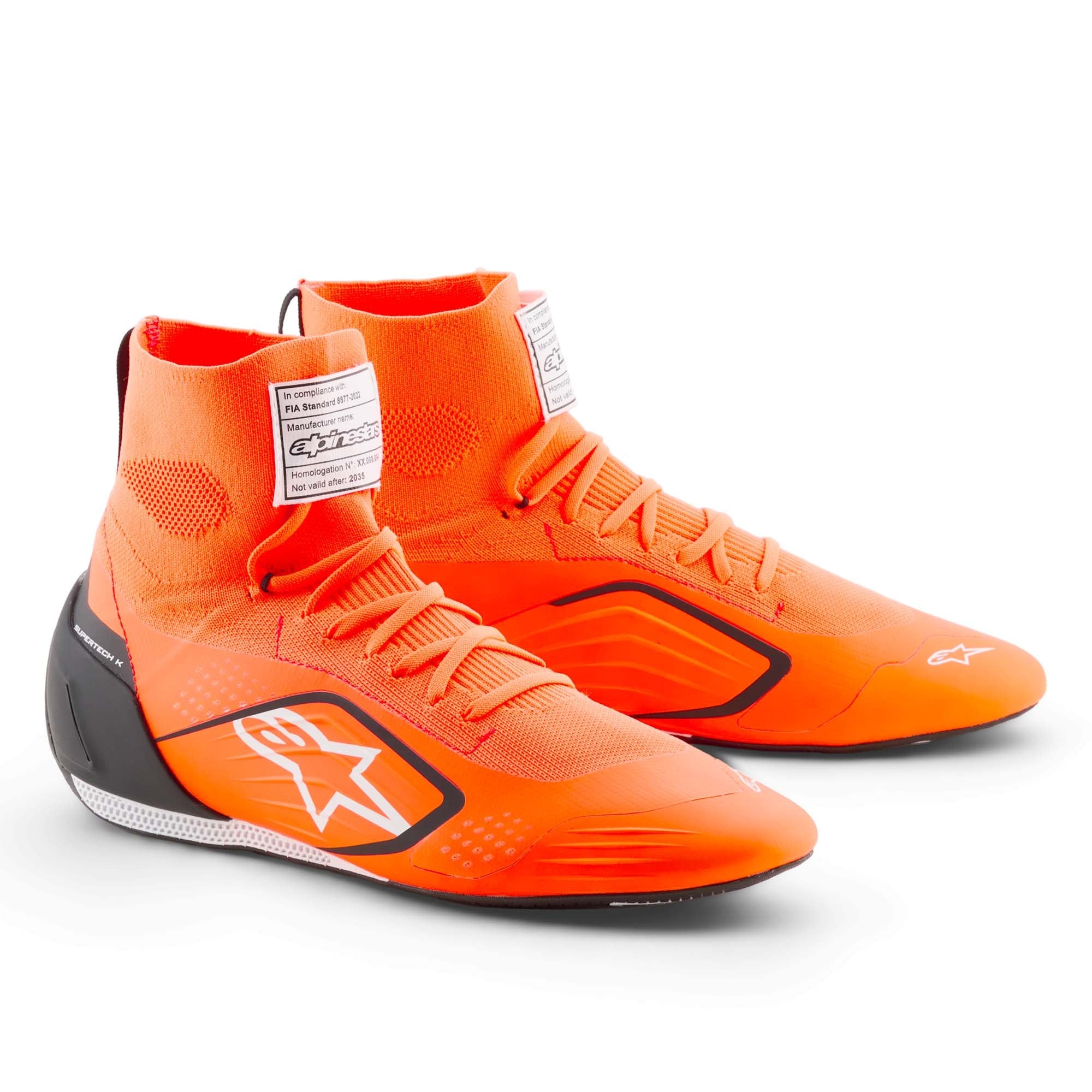 Alpinestars Supertech K FIA Karting Shoes in Orange Fluo/Black/White, showing fully knitted upper, TPU heel counter, and ultra-thin F1-derived rubber outsole.